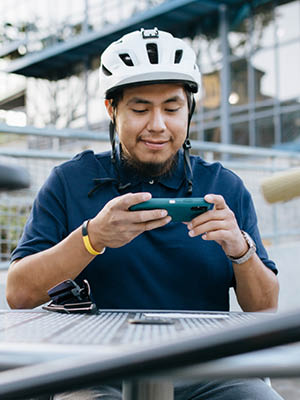 bicyclist using a smart phone