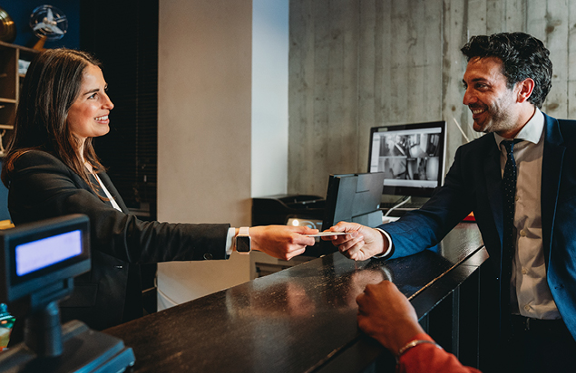 man paying with a card