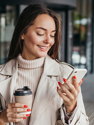 woman looking at her phone