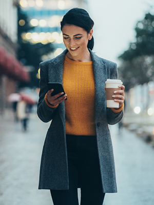 woman looking at her phone