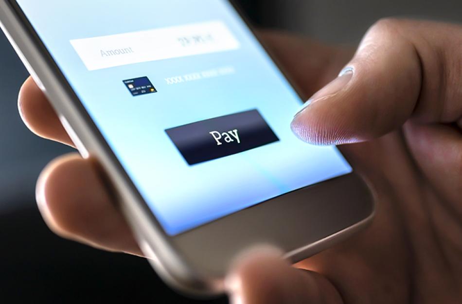picture of someone paying with their phone