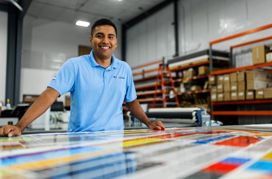 man working on something in a warehouse