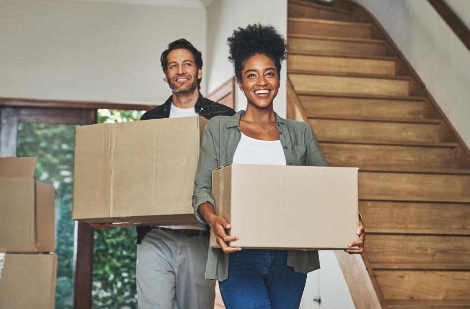 couple holding boxes