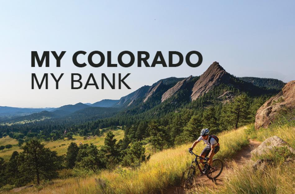 man bicycling in the mountains