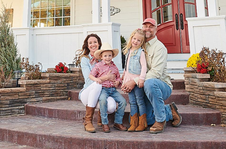 picture of a family sitting on the front porch