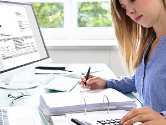 woman using a calculator
