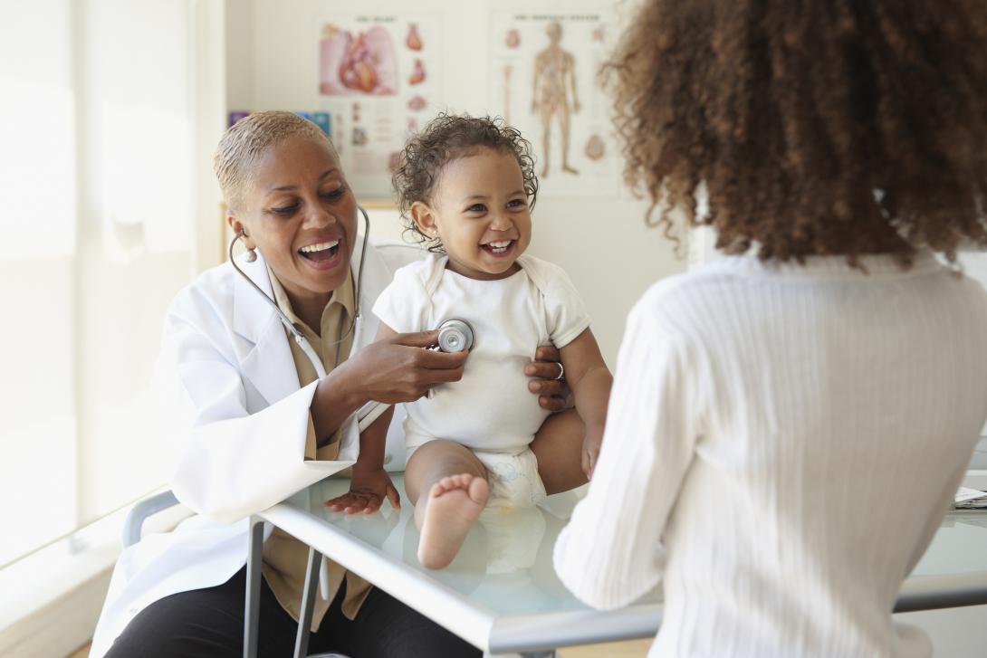 doctor holding a baby